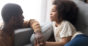 A father talking to his daughter