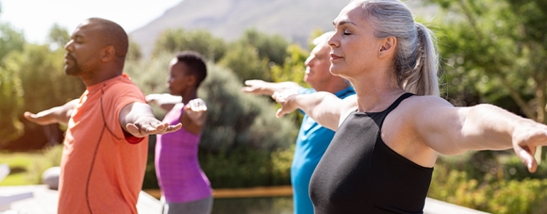 people doing yoga outside