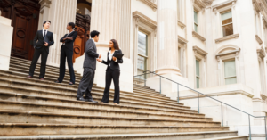 policy makers on the steps of a courthouse