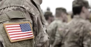 closeup of American flag patch on army fatigues