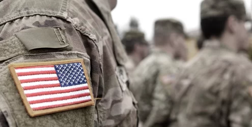 closeup of American flag patch on army fatigues