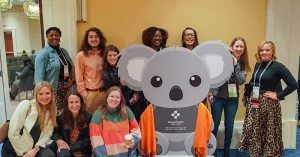 MHFA Summit participants with ALGEE koala sculpture