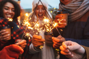 People holding sparklers