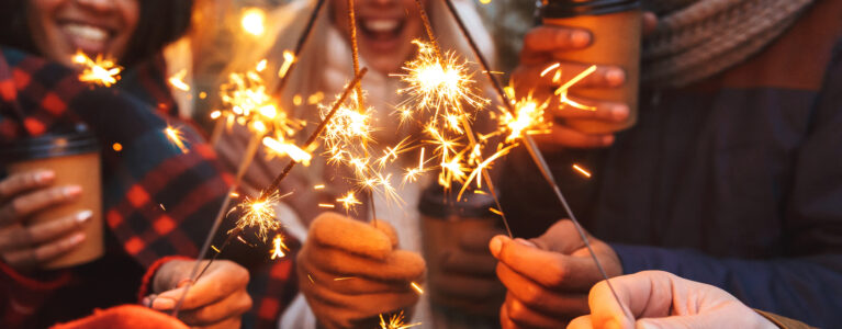 People holding sparklers