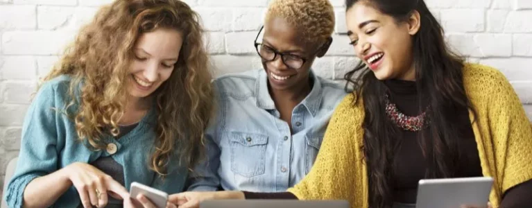 happy employees talking and laughing together