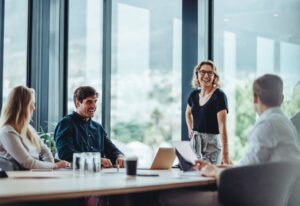 employees discuss workplace mental health